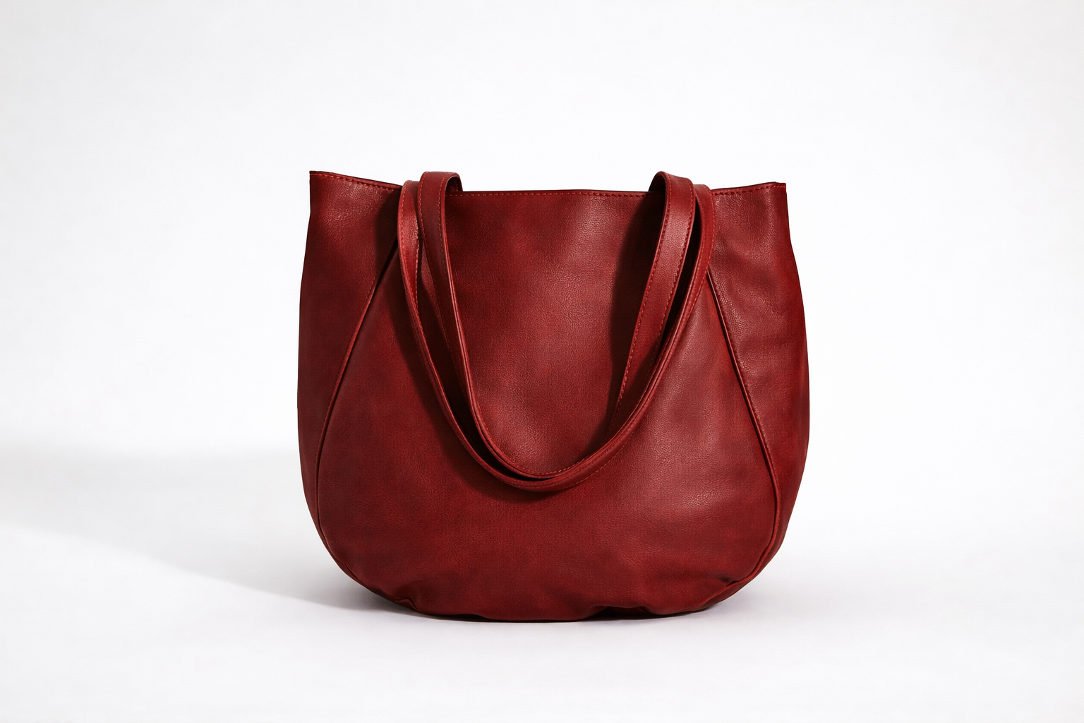 Bolso de cuero amplio y color terracota